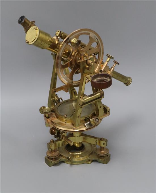 Troughton and Simms, London. A late 19th century brass theodolite, with central compass, cased